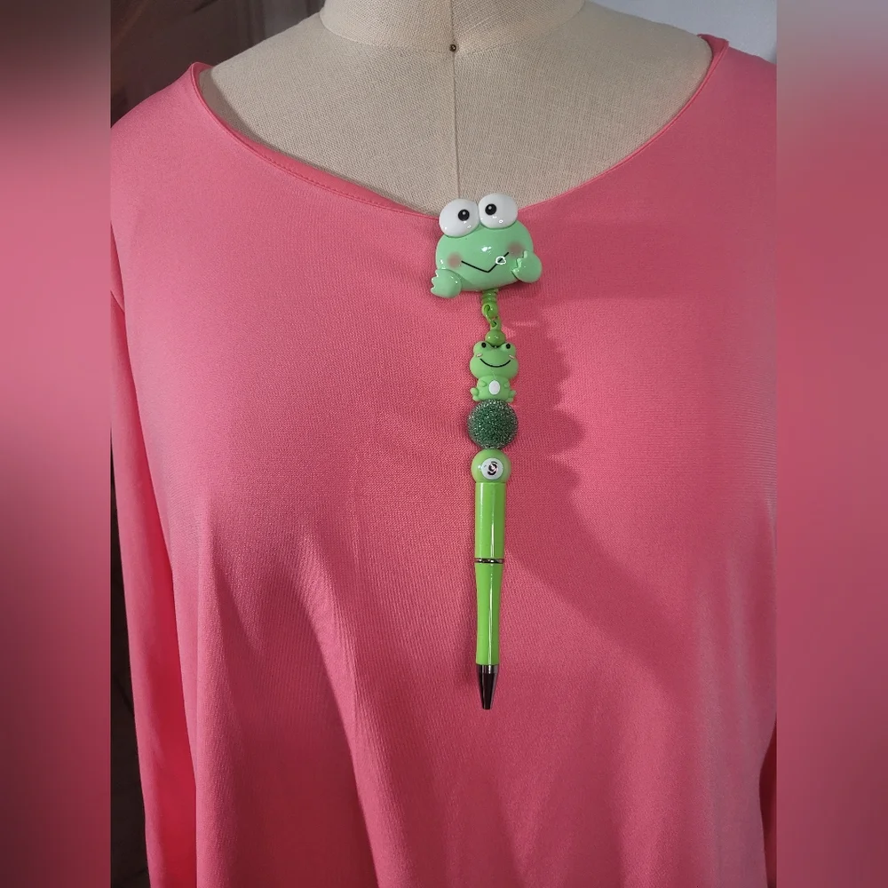 Green frog pen. Homemade and with a clip so you don't lose it.